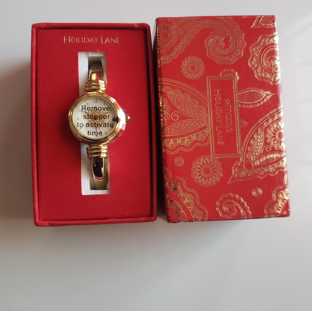 Macy's Holiday Lane watch NWT. Color gold.
